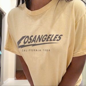 brandy melville aleena yellow los angeles tee